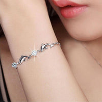 Load image into Gallery viewer, Dolphins Crystal and Silver Plated Bracelet
