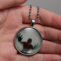 Load image into Gallery viewer, Glow In The Dark Steampunk Man In Pendant Necklace
