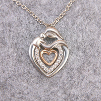Load image into Gallery viewer, Mother and Child Pendant Necklace
