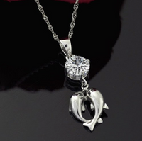 Load image into Gallery viewer, Dolphin Crystal and Sterling Silver Necklace
