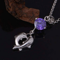 Load image into Gallery viewer, Dolphin Crystal and Sterling Silver Necklace
