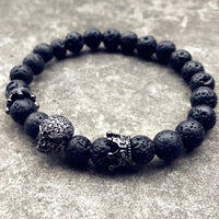 Load image into Gallery viewer, Black Lava Rock Skull Bracelets
