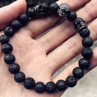 Load image into Gallery viewer, Black Lava Rock Skull Bracelets
